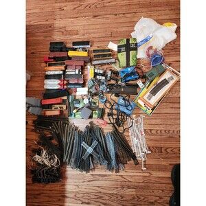 Vintage HO scale model trains, Track, and More  mixed die cast and plastic.